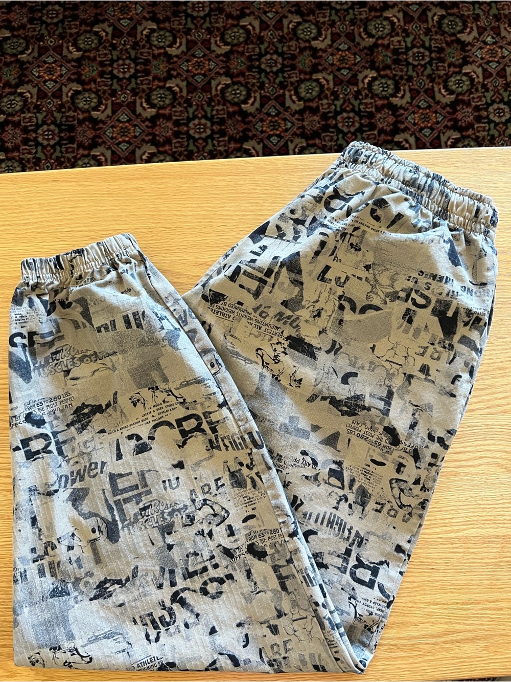 Gymshark Gray Jogger Pants with Black Graphic Print